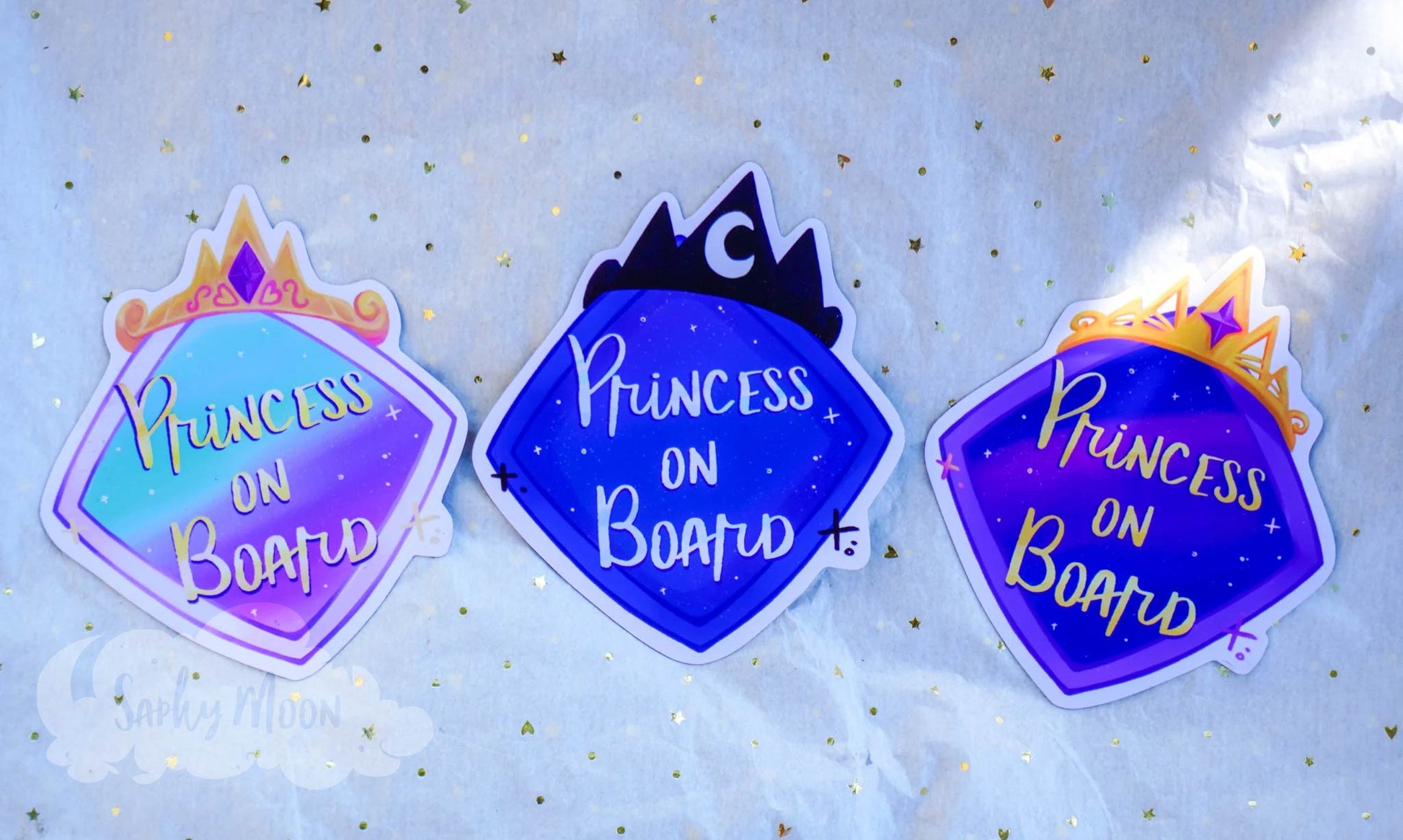 Three 'Princess on Board' stickers with crowns on a light blue background.